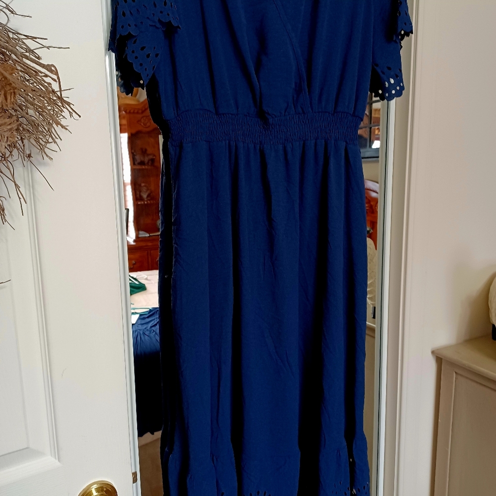 NWT Bloomchic Dress with pockets 100%Polyester cut eyelets on bottom and sleeves